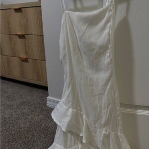 white mini dress with open back